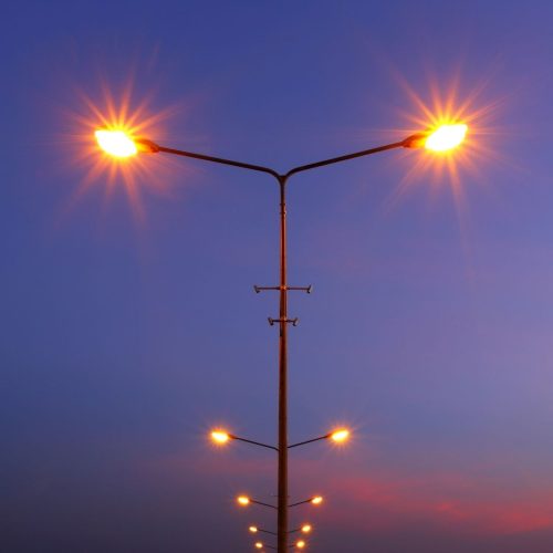 Close up of a modern lens street light installed on a commercial street