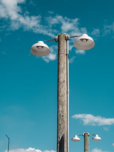 Close up view of a galvanized swaged pole for outdoor lighting