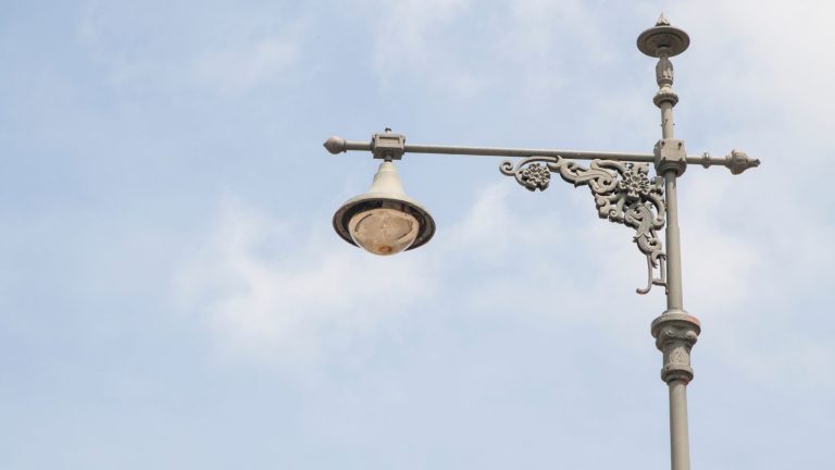 Decorative lighting pole design for urban walkways and parks