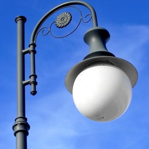 Elegant street decorative pole with solar powered top light