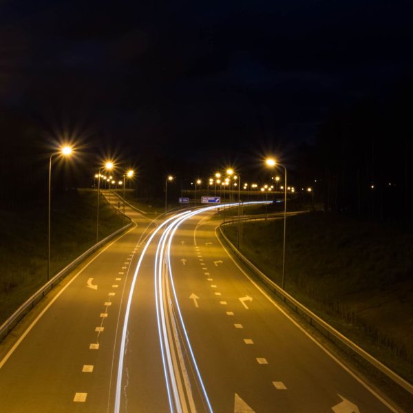 Energy efficient solar highway lights illuminating a rural road