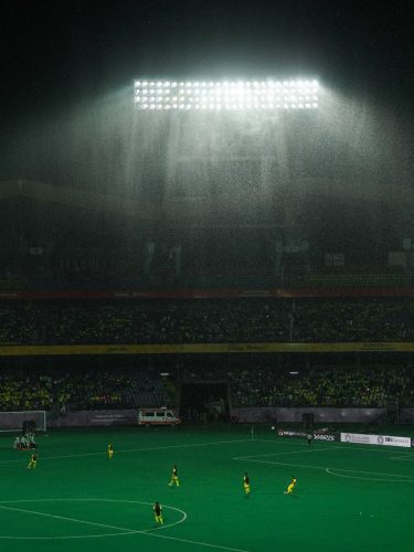 High efficiency indoor stadium lights illuminating a basketball court