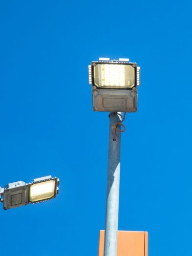 Industrial LED light fixtures installed in a large manufacturing plant