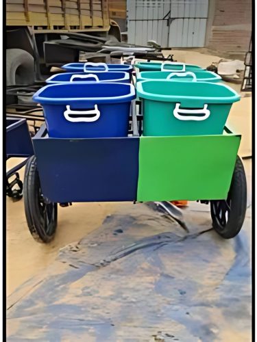 Side view of eco friendly E Rickshaw Tricycle Dustbin used for municipal waste