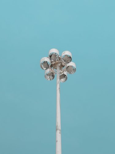 Smart lens flood lights with solar power integration by Triveni Solar