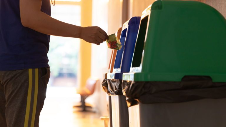 Stackable plastic dustbins in multiple colors for easy segregation