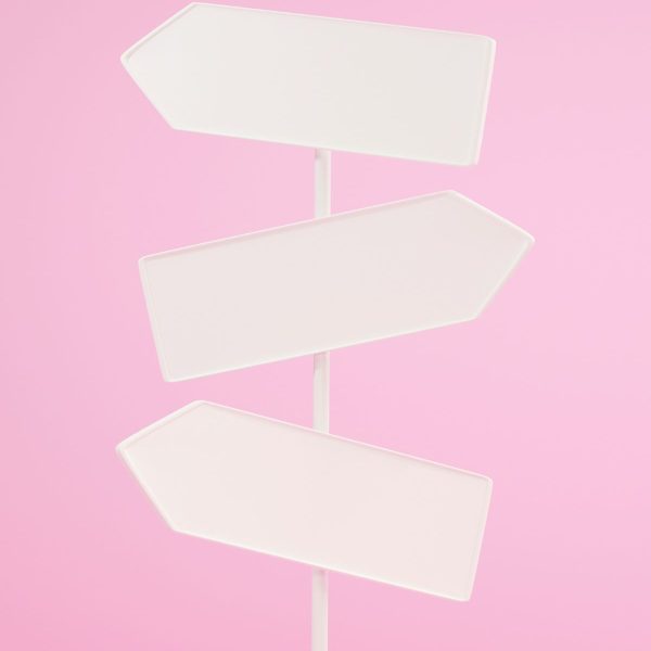 Stylish signage decorative pole installed at a commercial complex entrance