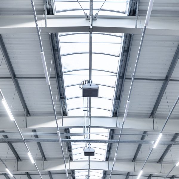 TriveniSolar’s industries LED light used in a factory workspace