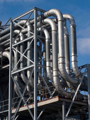 Trivenisolar branded steel tubes arranged in parallel rows