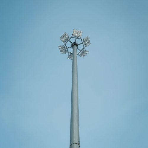 Trivenisolar high mast pole with LED fixtures at night